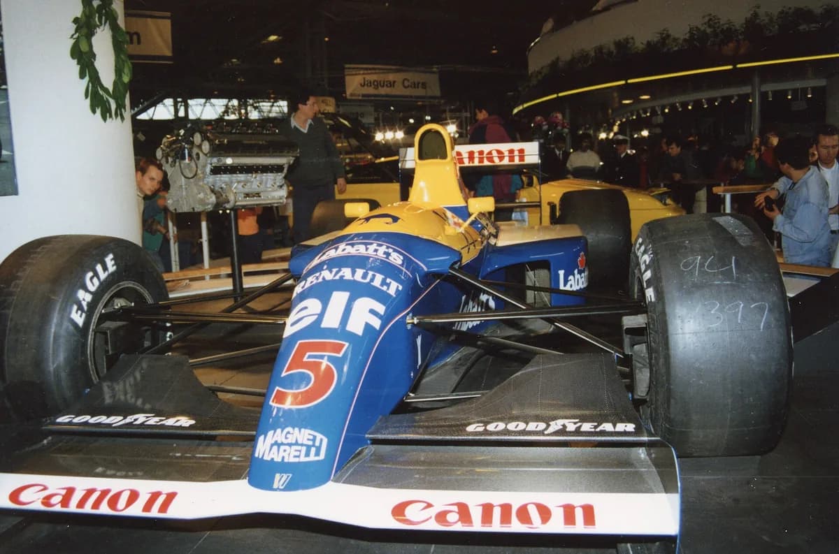 Nigel Mansell's 1992 Williams-Renault FW14B in Red 5 livery at a car show